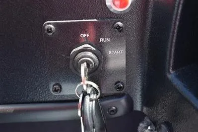 Slide: The Image of Ignition switch of 2026 Lowe Fish & Ski 1700 boat with key inserted. - 32