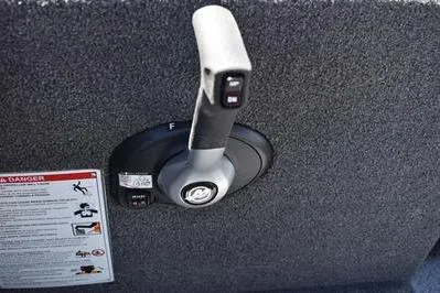 Slide: The Image of Throttle control lever on a 2026 Lowe Fish & Ski 1700 boat. - 33