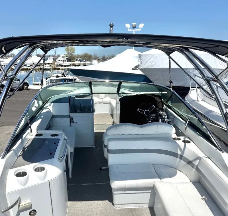 Slide: The Image of Interior of a 2013 Formula 29 BR boat with seating area. - 2