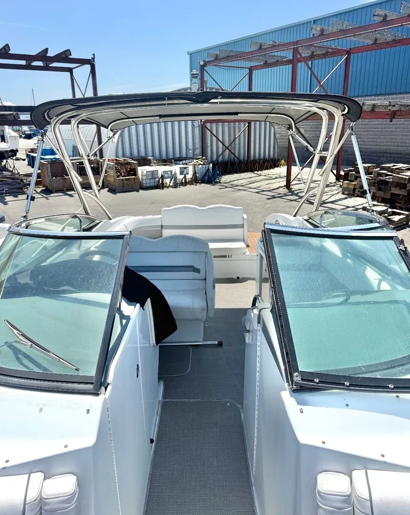 Slide: The Image of 2013 Formula 29 BR boat with open cockpit and bimini top. - 3