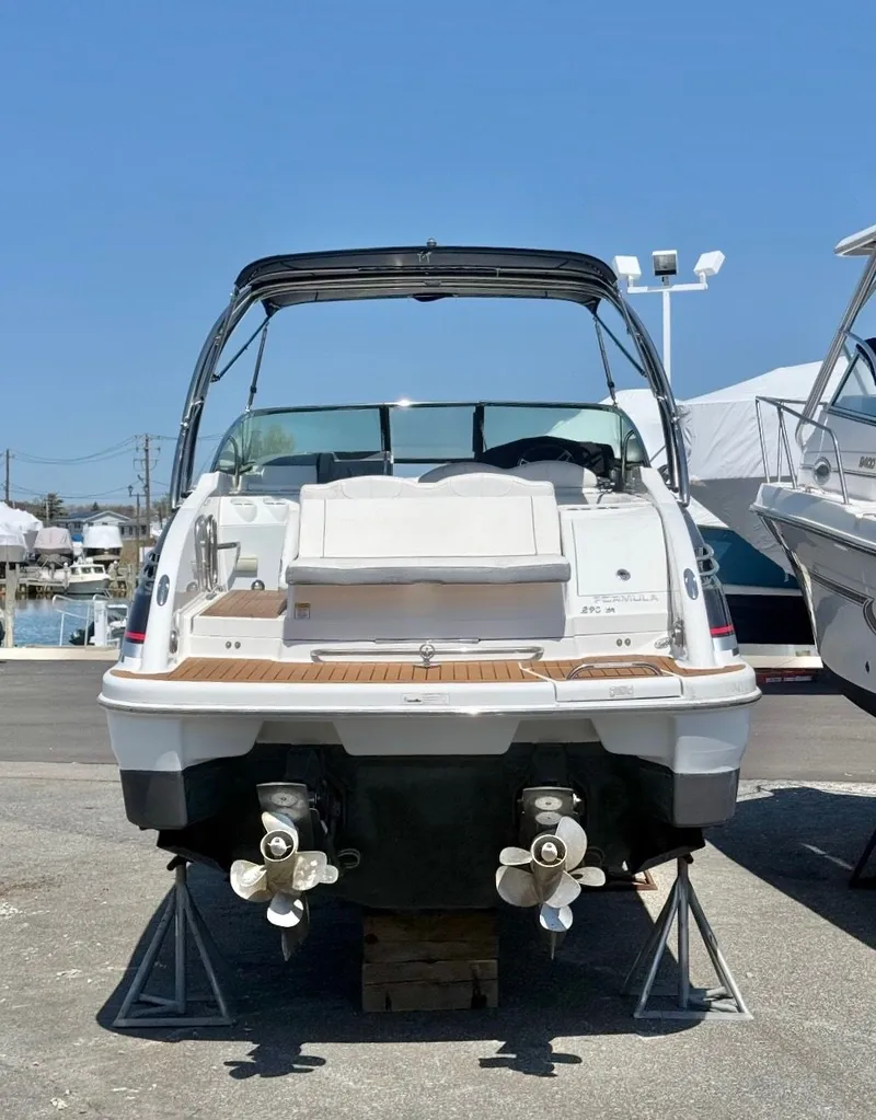 Slide: The Image of Rear view of a 2013 Formula 29 BR boat on stands. - 4