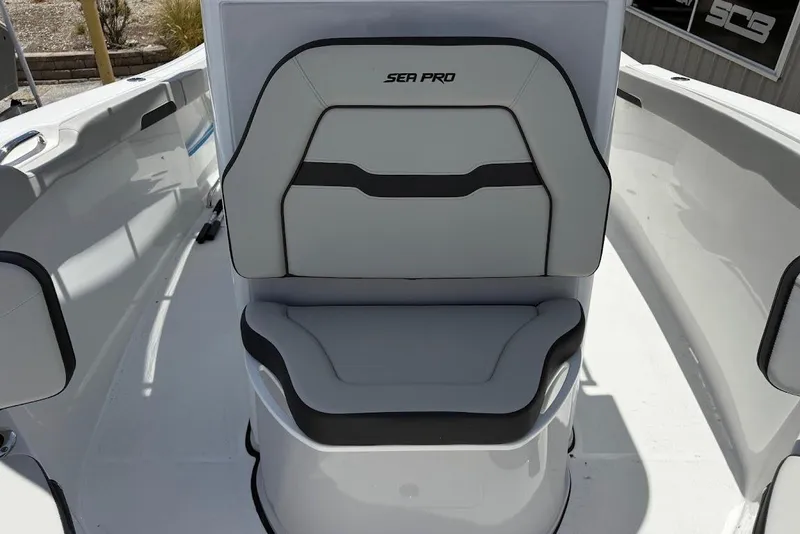 Slide: The Image of 2026 Sea Pro 262 Offshore boat seat with sleek design and comfortable padding. - 12