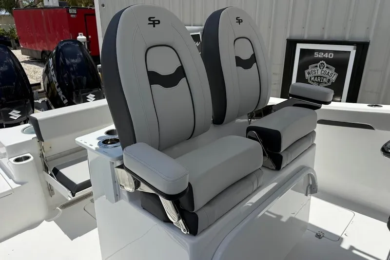 Slide: The Image of 2026 Sea Pro 262 Offshore boat seats with armrests, featuring sleek design and comfort. - 18