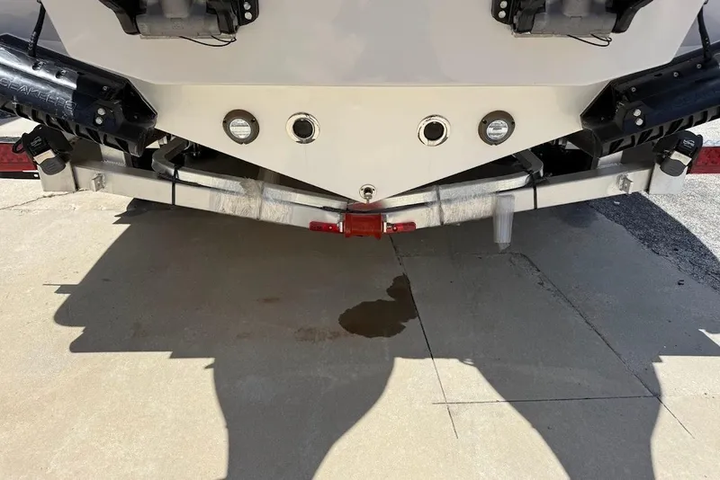 Slide: The Image of Rear view of 2026 Sea Pro 262 Offshore boat on trailer, showing hull and fittings. - 7