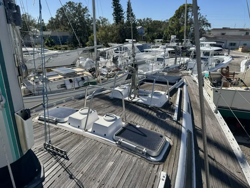 Slide: The Image of Deck of a 1987 Wauquiez Centurion 47 sailboat in harbor. - 22