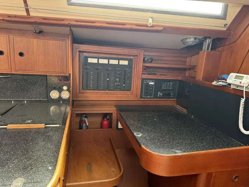 Slide: The Image of Interior of 1987 Wauquiez Centurion 47 yacht with navigation area. - 28