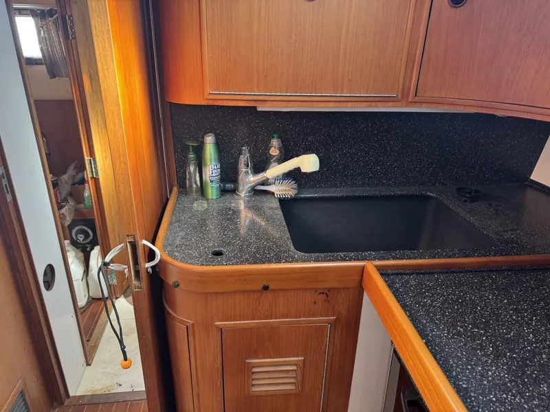 Slide: The Image of Galley area on a 1987 Wauquiez Centurion 47 yacht. - 36