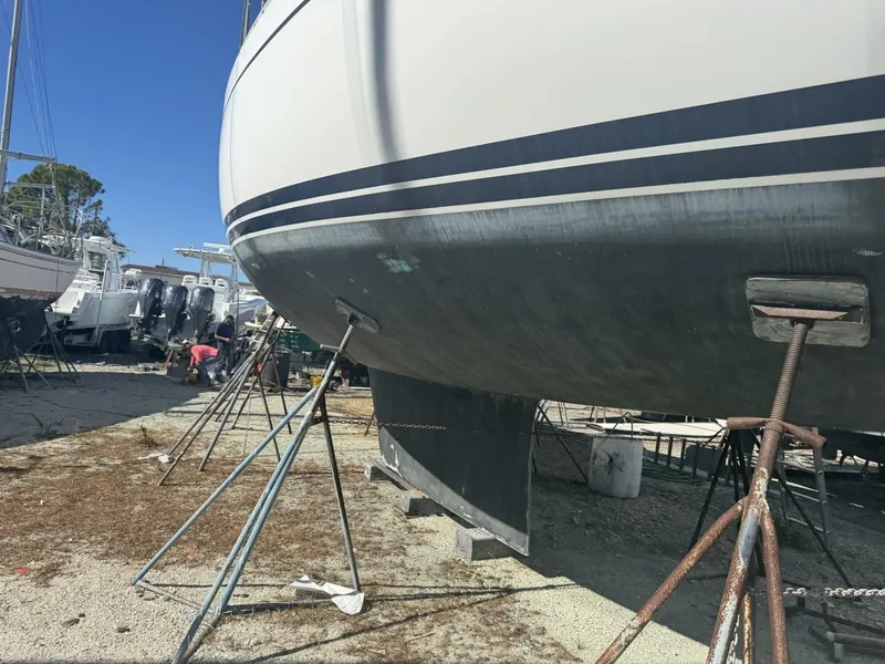 Slide: The Image of 1987 Wauquiez Centurion 47 sailboat in dry dock. - 4