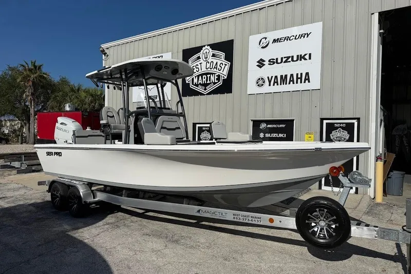 The Image of 2026 Sea Pro 250 Bay boat on trailer at West Coast Marine dealership. - 1