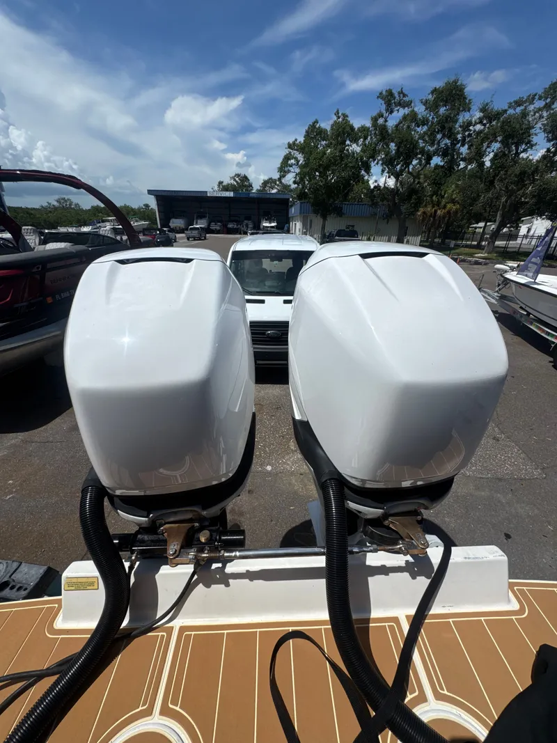 Slide: The Image of Two outboard motors on a 2006 Jupiter 31 CC boat. - 10