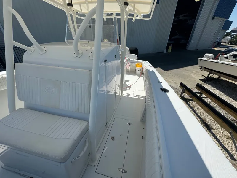 Slide: The Image of 2006 Jupiter 31 CC boat with forward seating at the dock. - 22