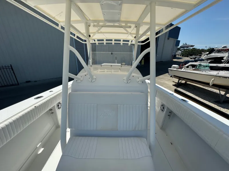 Slide: The Image of 2006 Jupiter 31 CC boat with forward seating at the dock. - 23