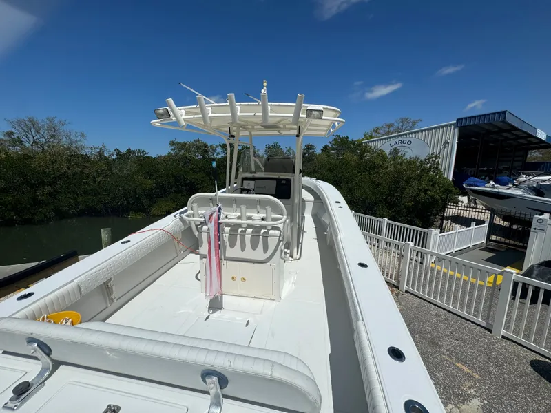 Slide: The Image of 2006 Jupiter 31 CC boat with forward seating at the dock. - 24