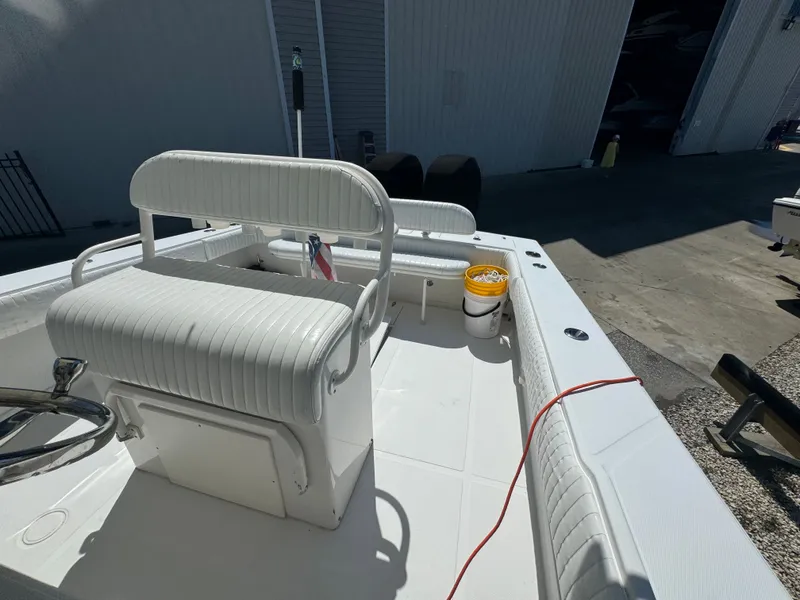 Slide: The Image of 2006 Jupiter 31 CC FWD boat with white seating. - 27