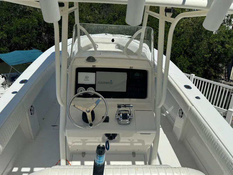 Slide: The Image of 2006 Jupiter 31 CC boat console with Garmin navigation. - 29