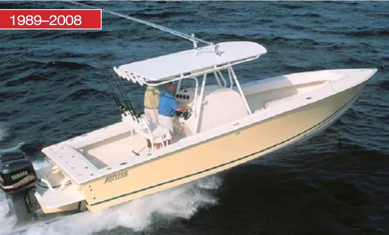 Slide: The Image of 2006 Jupiter 31 CC boat cruising on water. - 40