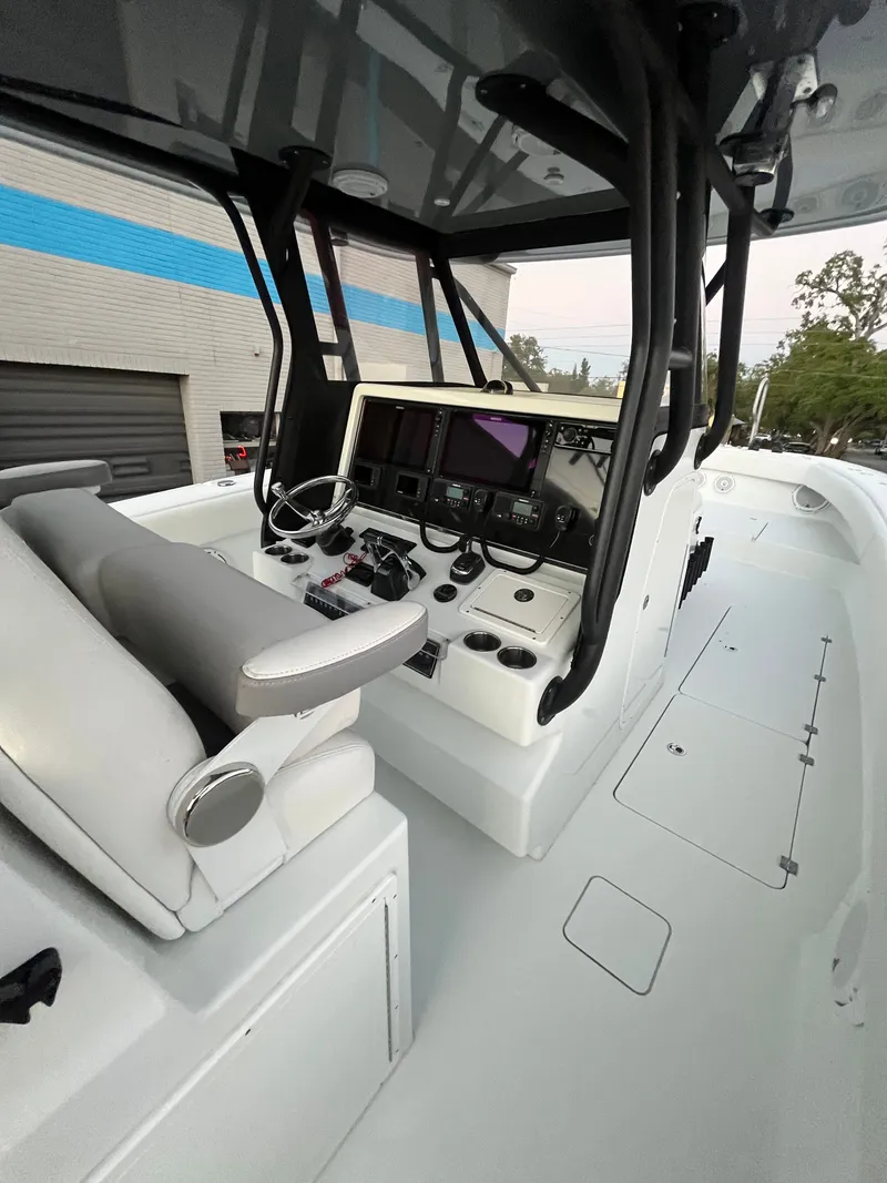 Slide: The Image of Interior view of a 2017 Freeman 37VH boat helm. - 12