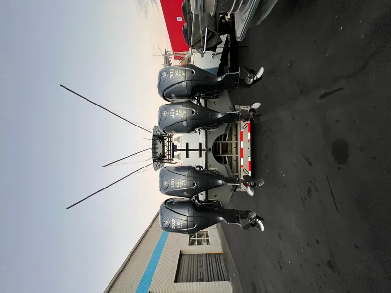 Slide: The Image of A 2017 Freeman 37VH with four powerful outboard engines on a trailer. - 6