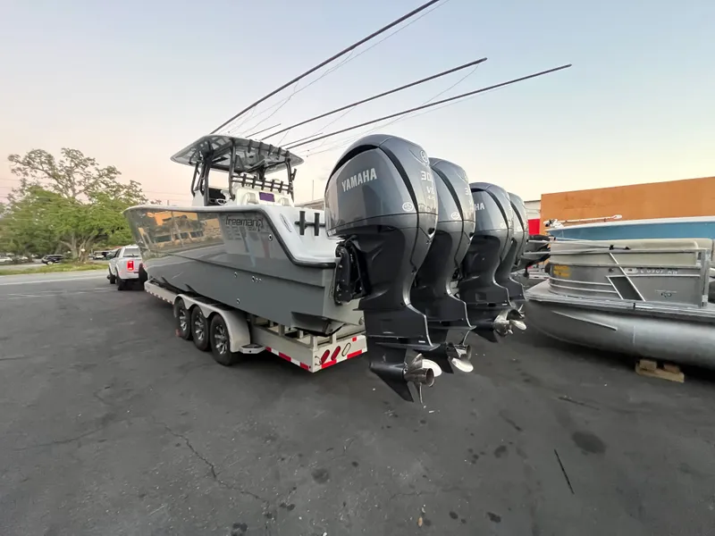 Slide: The Image of 2017 Freeman 37VH boat with four Yamaha outboard engines. - 4