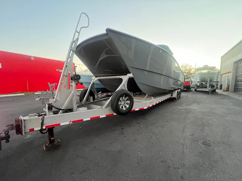 Slide: The Image of Freeman 37VH boat on trailer, 2017 model, in a storage area. - 5