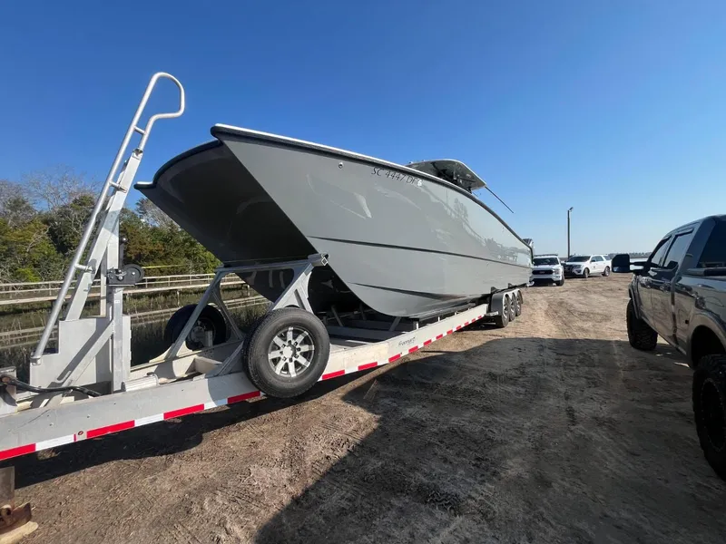 Slide: The Image of 2017 Freeman 37VH boat on trailer in sunny weather. - 7