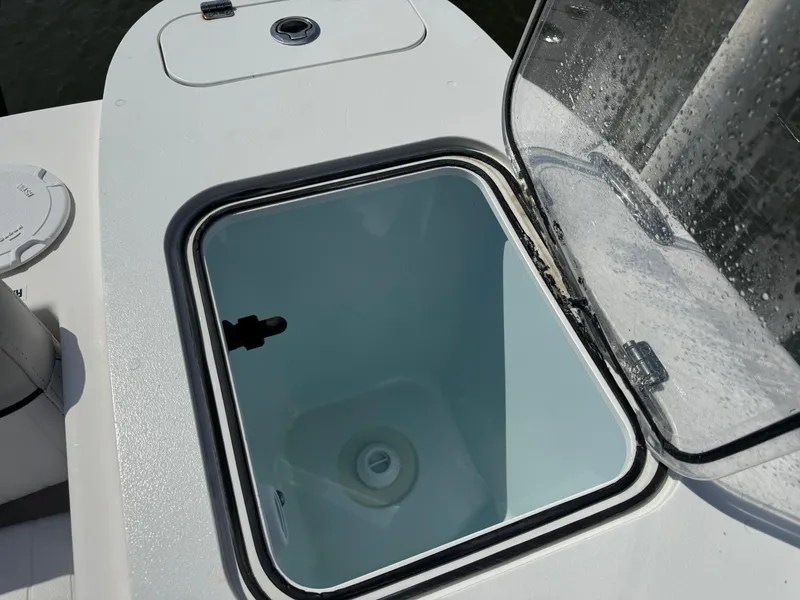 Slide: The Image of Open storage compartment on a 2020 Sea Fox 248 Commander boat. - 19