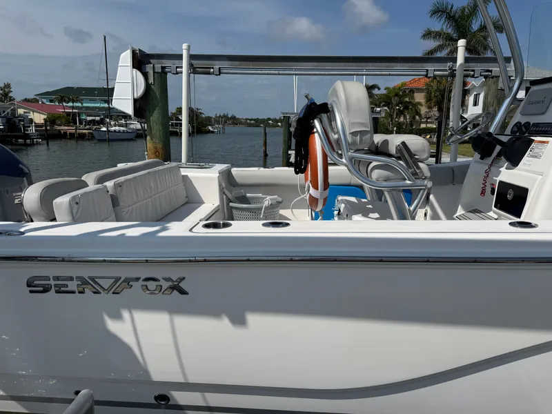 Slide: The Image of Sea Fox 248 Commander 2020 boat docked with equipment. - 37