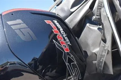 Slide: The Image of Close-up of a Mercury Pro XS 115 engine on a 2026 Lowe SF 212 Sport Fish boat. - 13