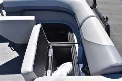 Slide: The Image of 2026 Lowe SF 212 Sport Fish boat with open storage compartment and cushioned seating. - 23