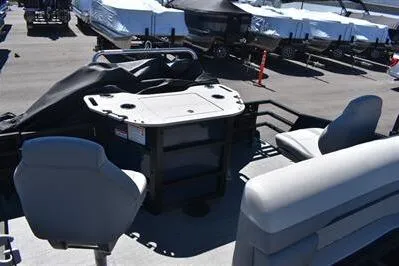 Slide: The Image of 2026 Lowe SF 212 Sport Fish boat interior with seating and fishing station. - 25