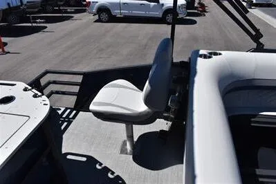 Slide: The Image of 2026 Lowe SF 212 Sport Fish boat interior with seating and fishing setup. - 26
