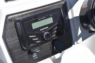 Slide: The Image of 2026 Lowe SF 212 Sport Fish boat dashboard with Kicker media center. - 32