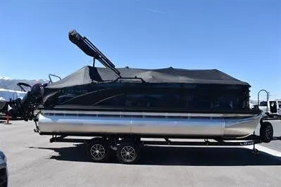 Slide: The Image of 2026 Lowe SF 212 Sport Fish pontoon boat with cover on trailer. - 4