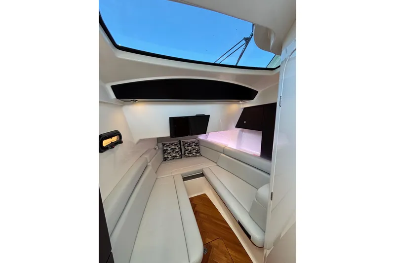 Slide: The Image of Luxurious interior of 2024 Boston Whaler 350 Realm with plush seating and modern design. - 34
