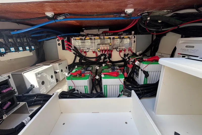 Slide: The Image of Electrical system of 2024 Boston Whaler 350 Realm with batteries and wiring. - 44