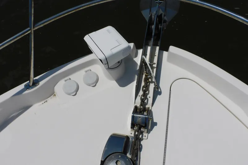 Slide: The Image of Bow of 2019 Sea Ray L550 yacht with anchor chain and winch system. - 11