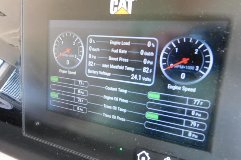 Slide: The Image of Display panel of a 2019 Sea Ray L550 showing engine metrics and gauges. - 26