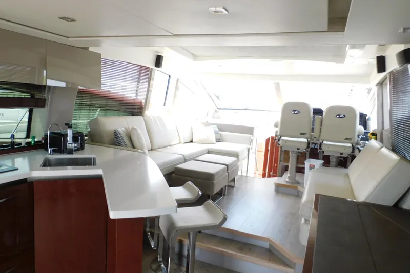 Slide: The Image of Luxurious interior of 2019 Sea Ray L550 yacht with modern seating and sleek design. - 46