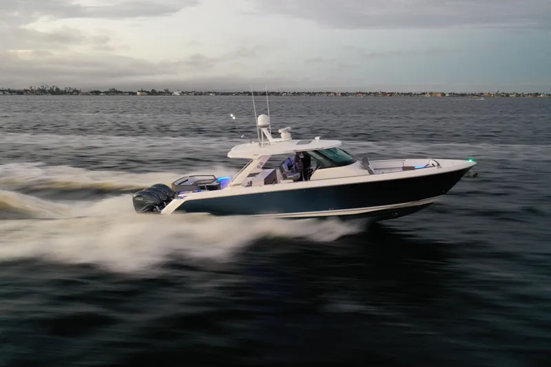 Slide: The Image of 2020 Tiara Yachts 43 LS cruising swiftly on open water. - 12