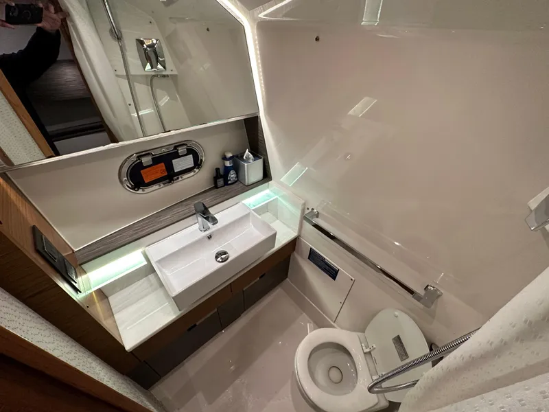Slide: The Image of 2020 Tiara Yachts 43 LS bathroom with modern sink, toilet, and sleek design. - 35