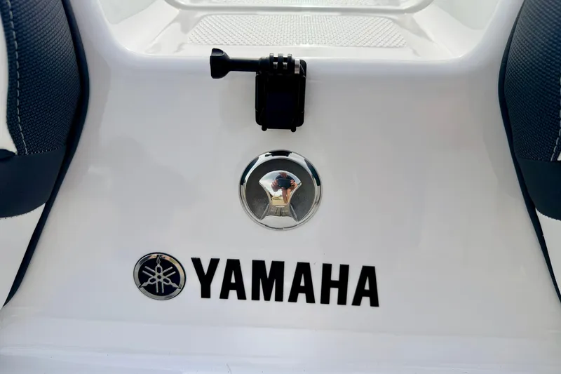 Slide: The Image of 2024 Yamaha AR195 boat interior with logo and seating detail. - 18