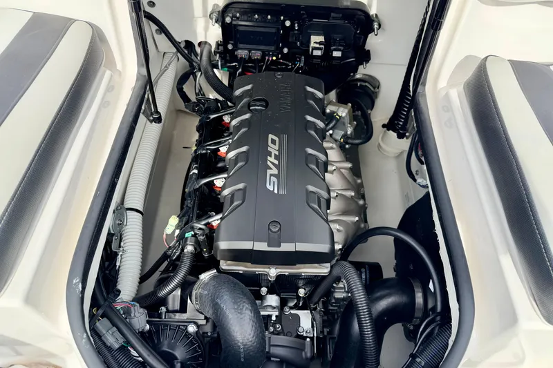 Slide: The Image of 2024 Yamaha AR195 engine compartment showcasing powerful marine engine design. - 27