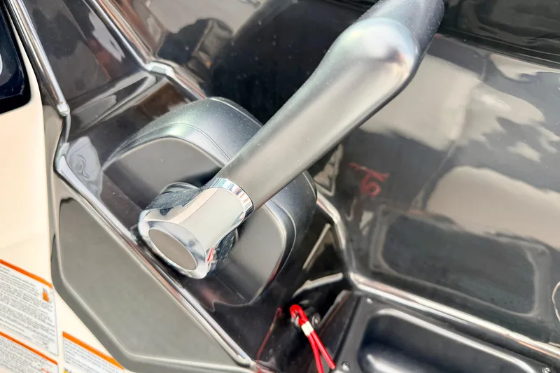 Slide: The Image of Close-up of 2024 Yamaha AR195 throttle control lever. - 39