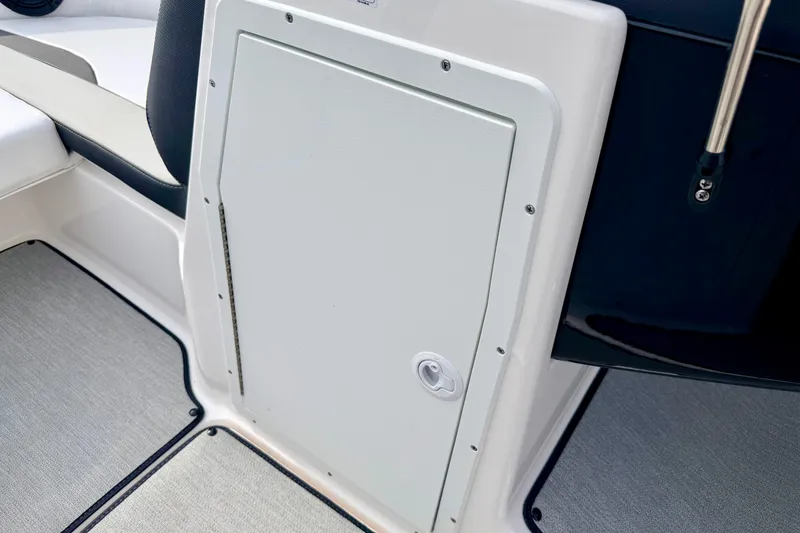 Slide: The Image of 2024 Yamaha AR195 boat interior storage compartment with sleek design and modern finish. - 45