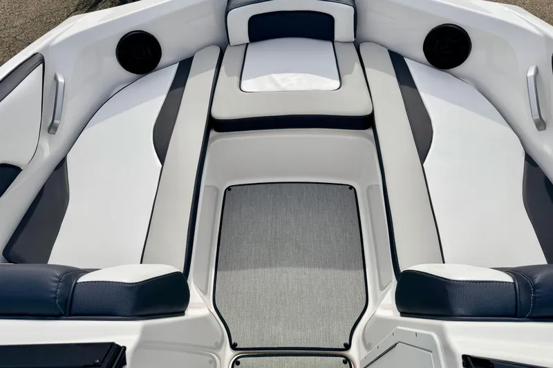 Slide: The Image of 2024 Yamaha AR195 boat interior with sleek seating and modern design. - 56