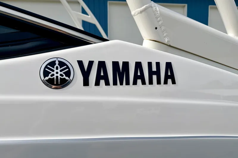 Slide: The Image of 2024 Yamaha AR195 boat logo on sleek white surface. - 7