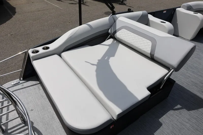 Slide: The Image of 2026 Lowe SS 210 CL boat with luxurious gray seating and cup holders. - 17
