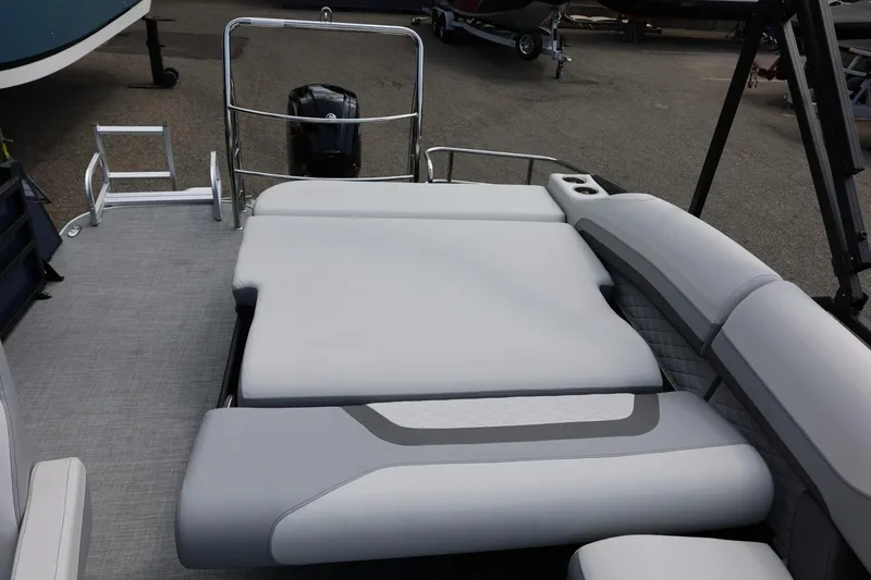 Slide: The Image of 2026 Lowe SS 210 CL pontoon boat with spacious seating and modern design. - 19