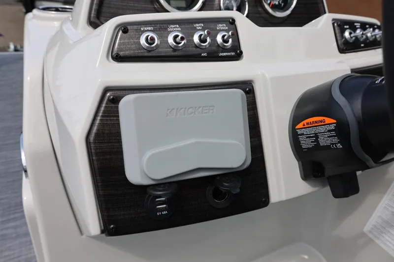 Slide: The Image of Control panel of 2026 Lowe SS 210 CL boat with stereo and USB ports. - 30