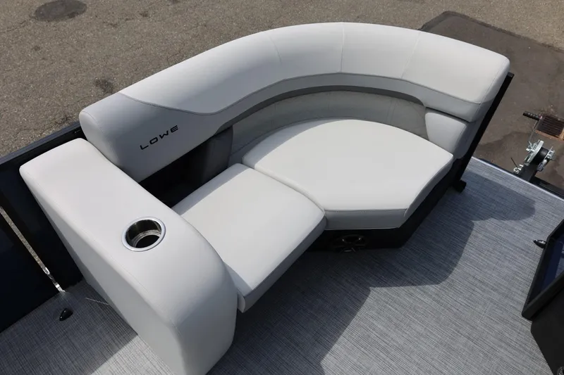 Slide: The Image of Luxurious seating on 2026 Lowe SS 210 CL pontoon boat with cup holder. - 34